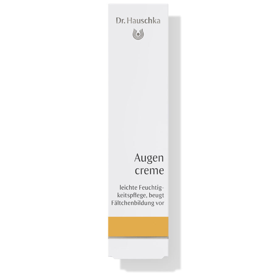 Dr. Hauschka Augencreme – weiße Tube mit goldfarbenem Streifen, weißer Hintergrund – Augenpflege
