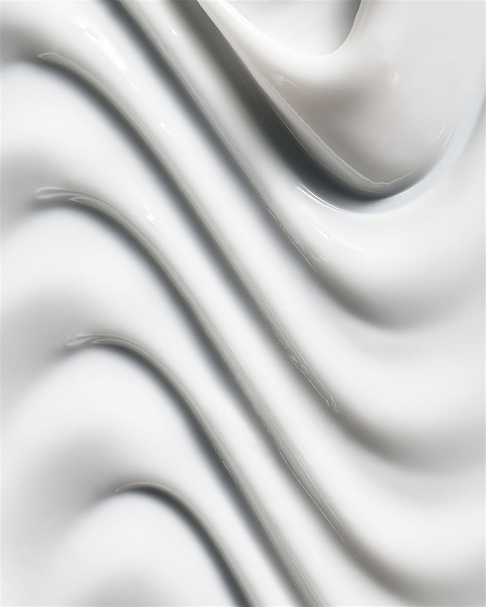 Botanical Body Cream Calantha – creamy texture, wavy, white background – body care