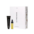 Le Prunier Petite Prunier Kit – black tube and yellow glass bottle with dropper, white box – skin care