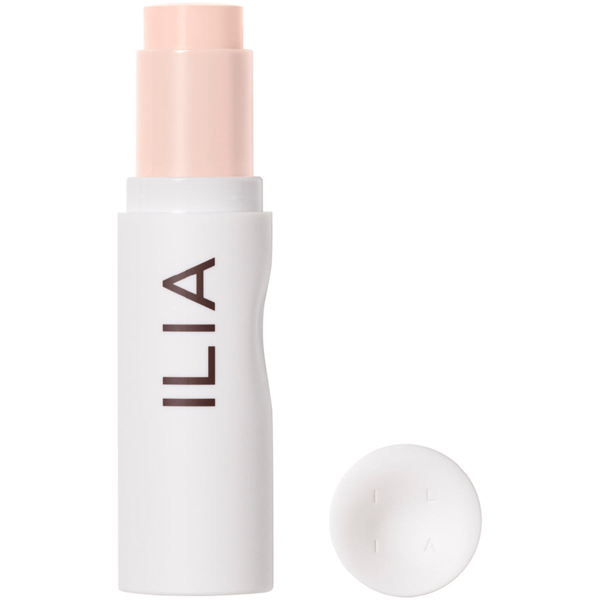 ILIA Foundation Stick in hellem Beigeton mit weißem Gehäuse.