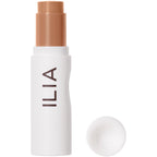 ILIA Skin Rewind Complexion Stick auf weißem Hintergrund, Make-up