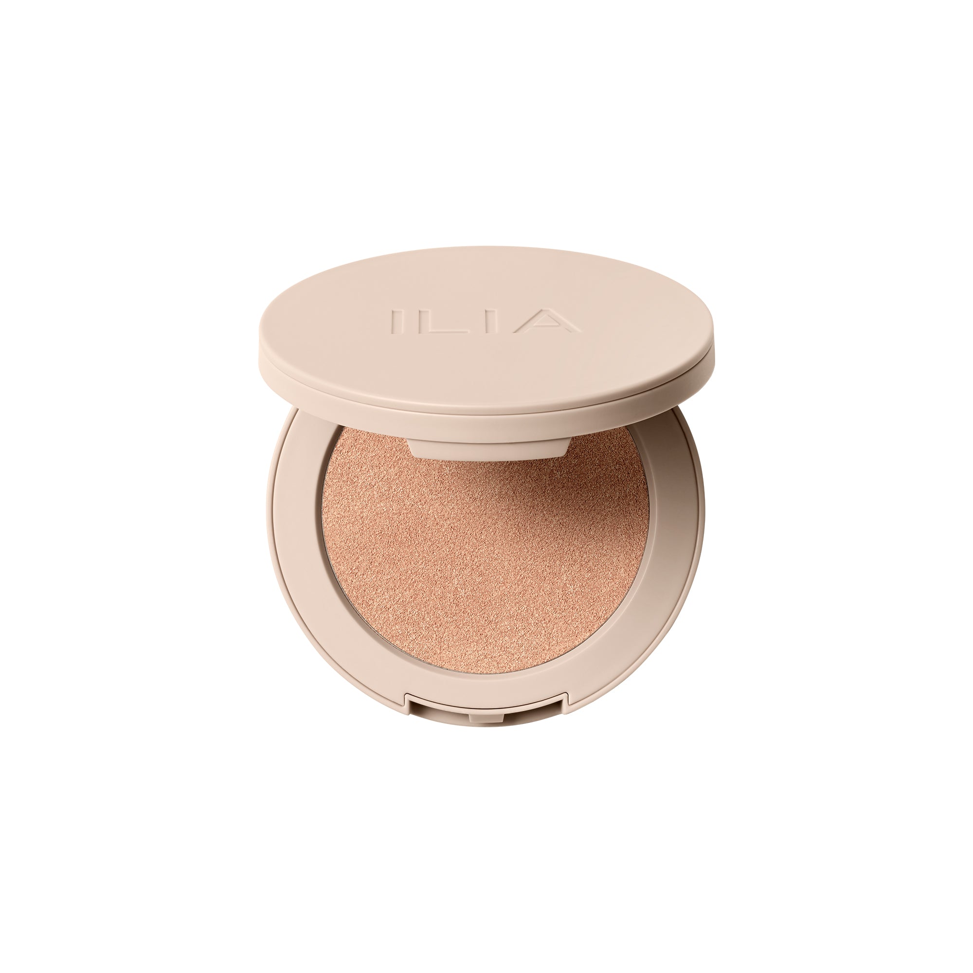 ILIA Lightshift Cream Highlighter in beigefarbenem Tiegel auf weißem Hintergrund, Make-up