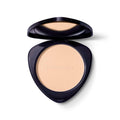 Dr. Hauschka Compact Powder 00 Translucent – schwarzes Puderdöschen, cremefarbener Puder, weißer Hintergrund – Make-up