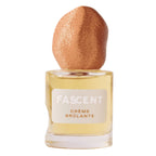 Fascent Crème Brûlante Eau de Parfum – clear glass bottle with rose gold spray cap, white background – perfume