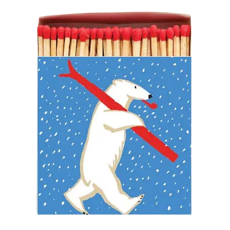 Polarbär auf Ski – Streichholzschachtel mit blauem Hintergrund und rotem Deckel – keine Schönheitsproduktverpackung