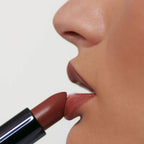 Lipstick 14 Caralluma – matte brown lipstick in black tube, white background – lip care
