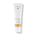 Dr. Hauschka Revitalisierende Maske – weiße Tube mit goldener Linie, weißem Deckel, weißem Hintergrund – Hautpflege