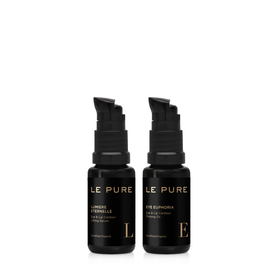 LE PURE E&L The Eye Set – zwei schwarze Pumpflaschen mit goldener Schrift, weißem Hintergrund – Augenpflege