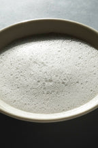 Smoothiebody Bath Urban Botanical – creamy foam in white bowl, gray background – body care