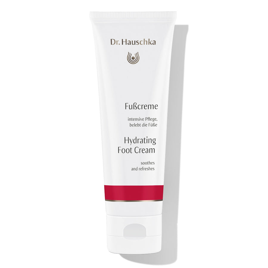 Dr. Hauschka Fußcreme – weiße Tube mit rotem Streifen, weißem Deckel, weißem Hintergrund – Fußpflege