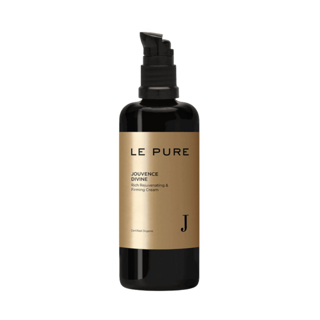 Le Pure Jouvence Divine – schwarze Flasche mit Pumpspender, goldene Etikette, weißer Hintergrund – Hautpflege