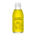 Susanne Kaufmann Arnica Body Oil in a glass bottle with white screw cap on white background, skin care