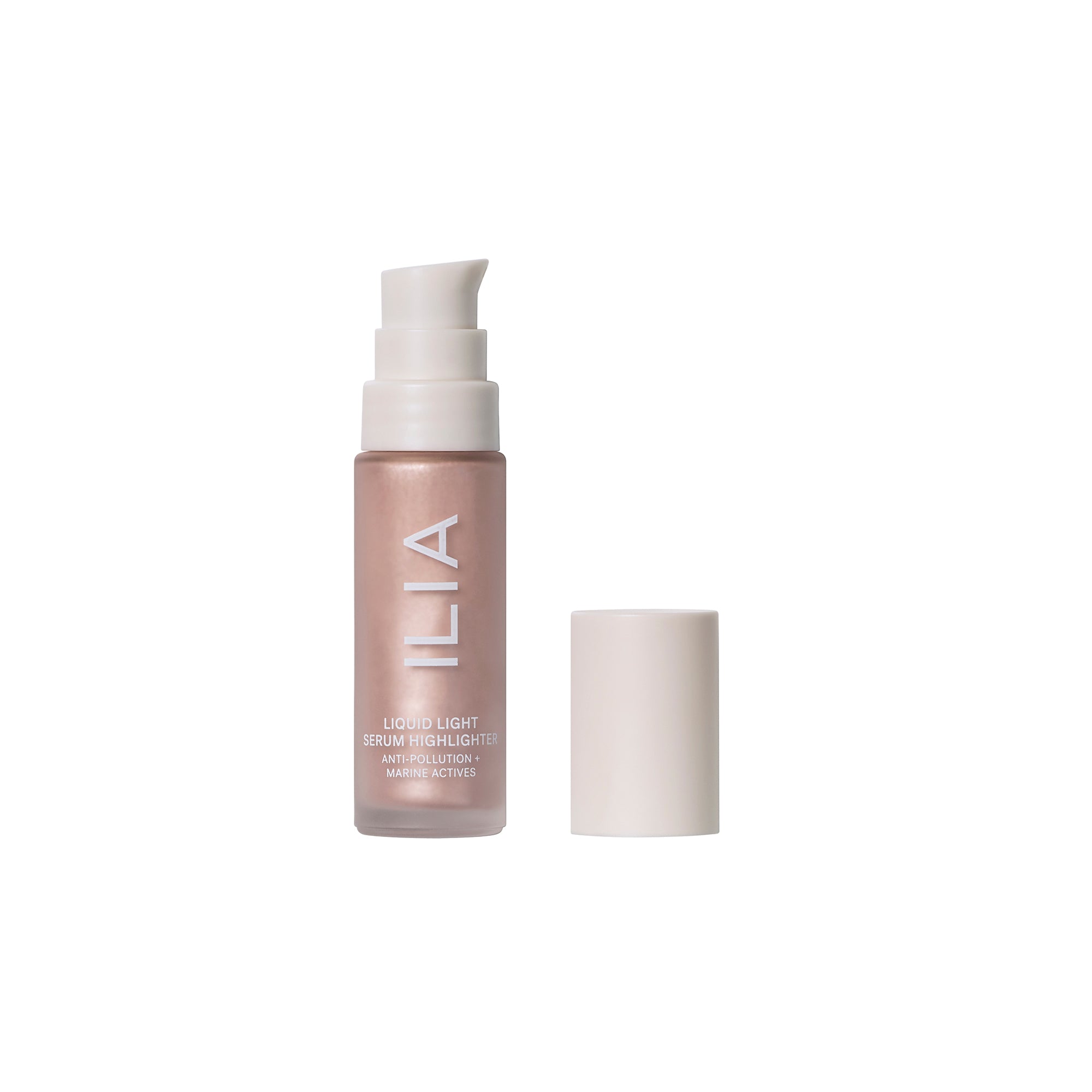 ILIA Liquid Light Serum Highlighter in a rose gold with white pump on a white background, skin care.