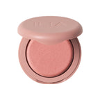 ILIA Soft Focus Blurring Blush in a pink round compact on a white background, makeup
