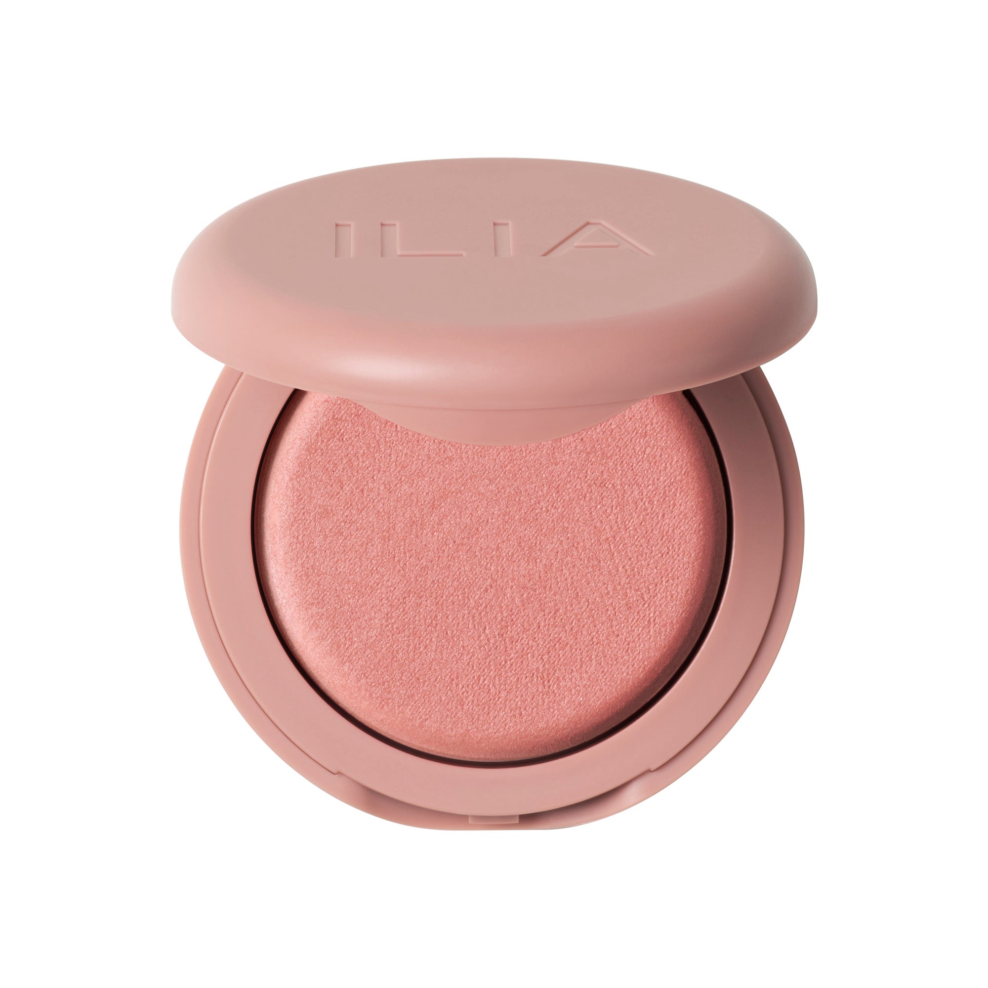 ILIA Soft Focus Blurring Blush in a pink round compact on a white background, makeup