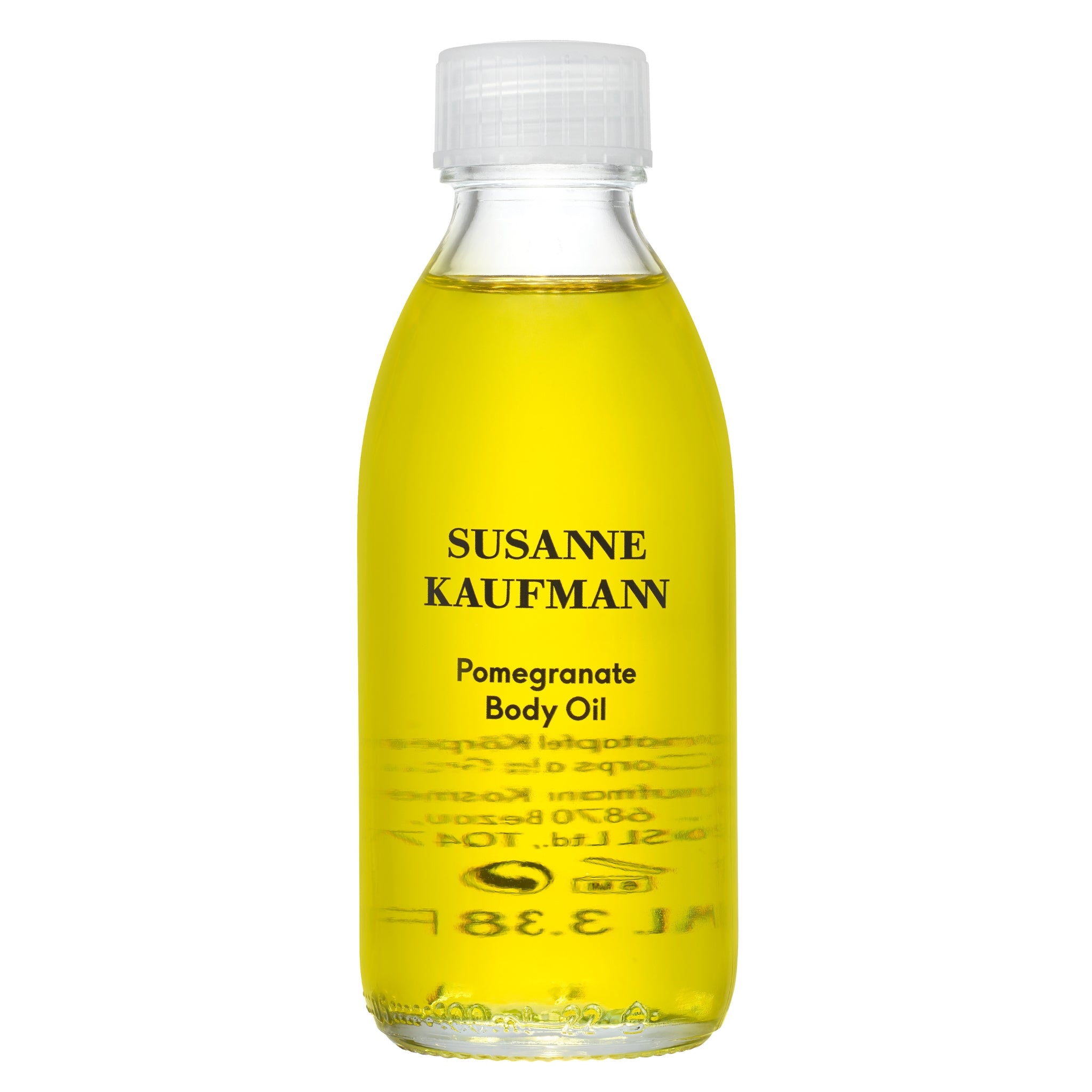 Susanne Kaufmann Pomegranate Body Oil in einer durchsichtigen Flasche mit weißem Schraubverschluss, Hautpflege
