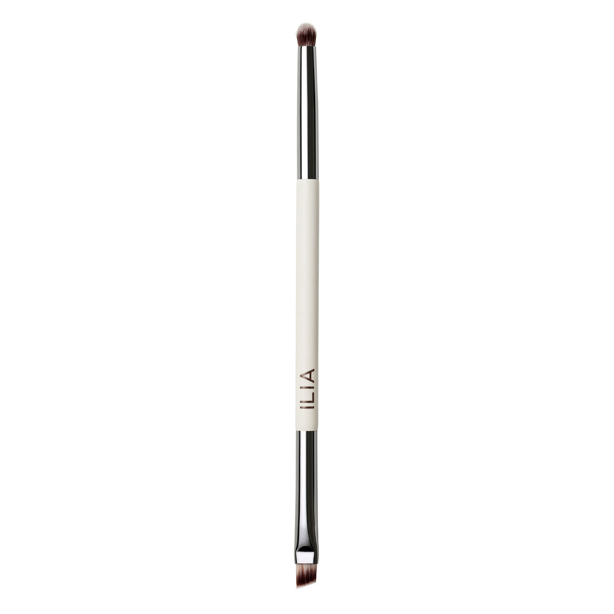 ILIA Angled Line + Smudge Brush with white handle and silver ferrules on a white background, makeup brush.