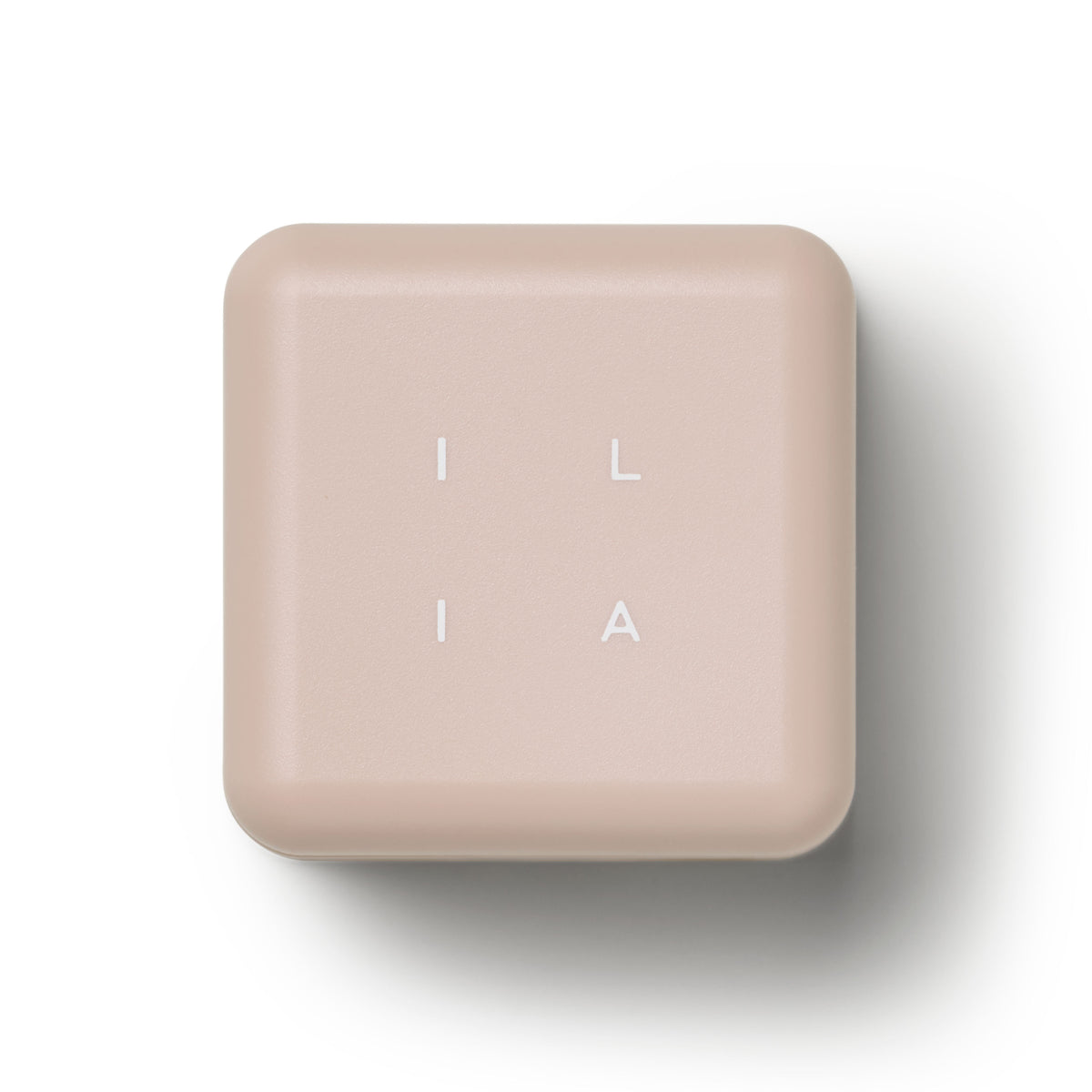 ILIA Precision Dual Sharpener in a beige square case against a white background. Makeup accessory.