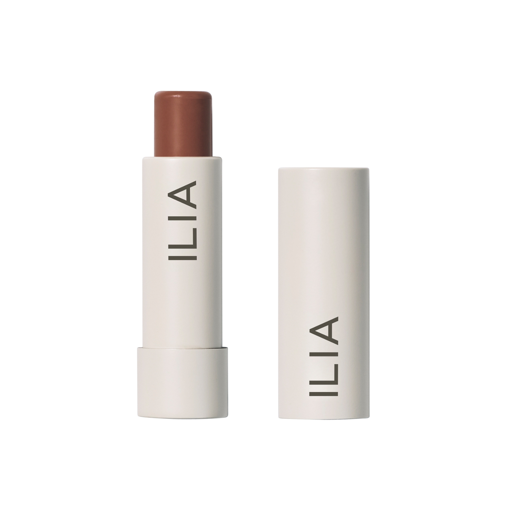 ILIA Balmy Tint Hydrating Lip Balm in weißer Tube mit braunem Lippenstift auf weißem Hintergrund, Lippenpflege