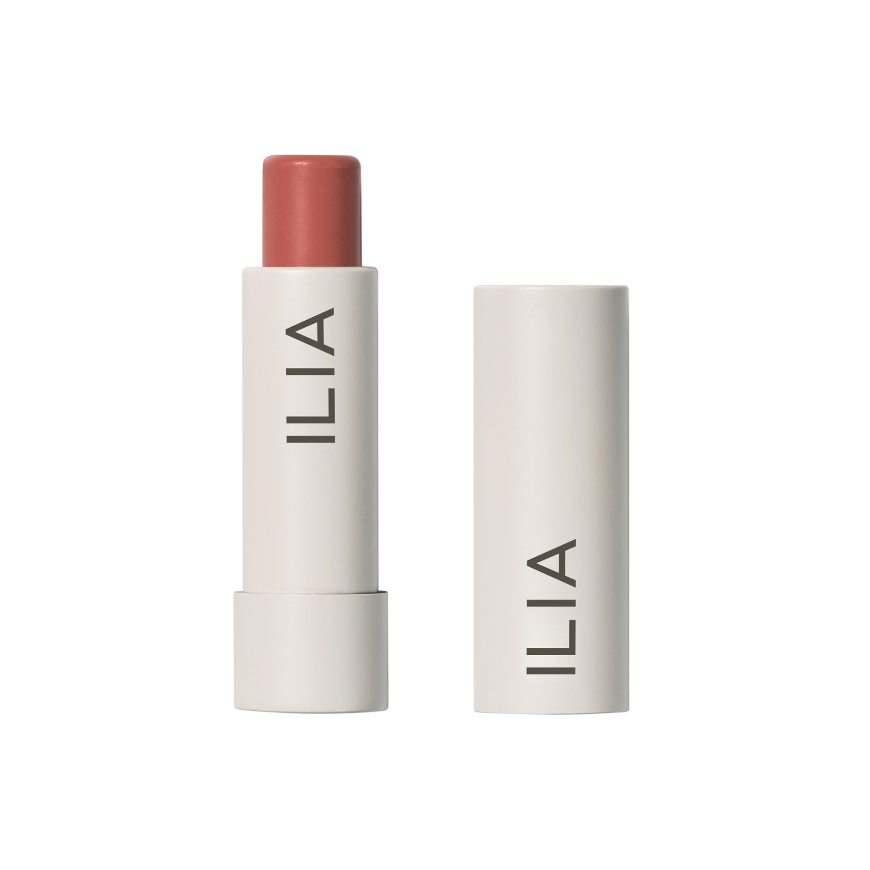 ILIA Balmy Tint Hydrating Lip Balm in einer weißen Tube mit weißem Deckel auf weißem Hintergrund, Lippenpflege