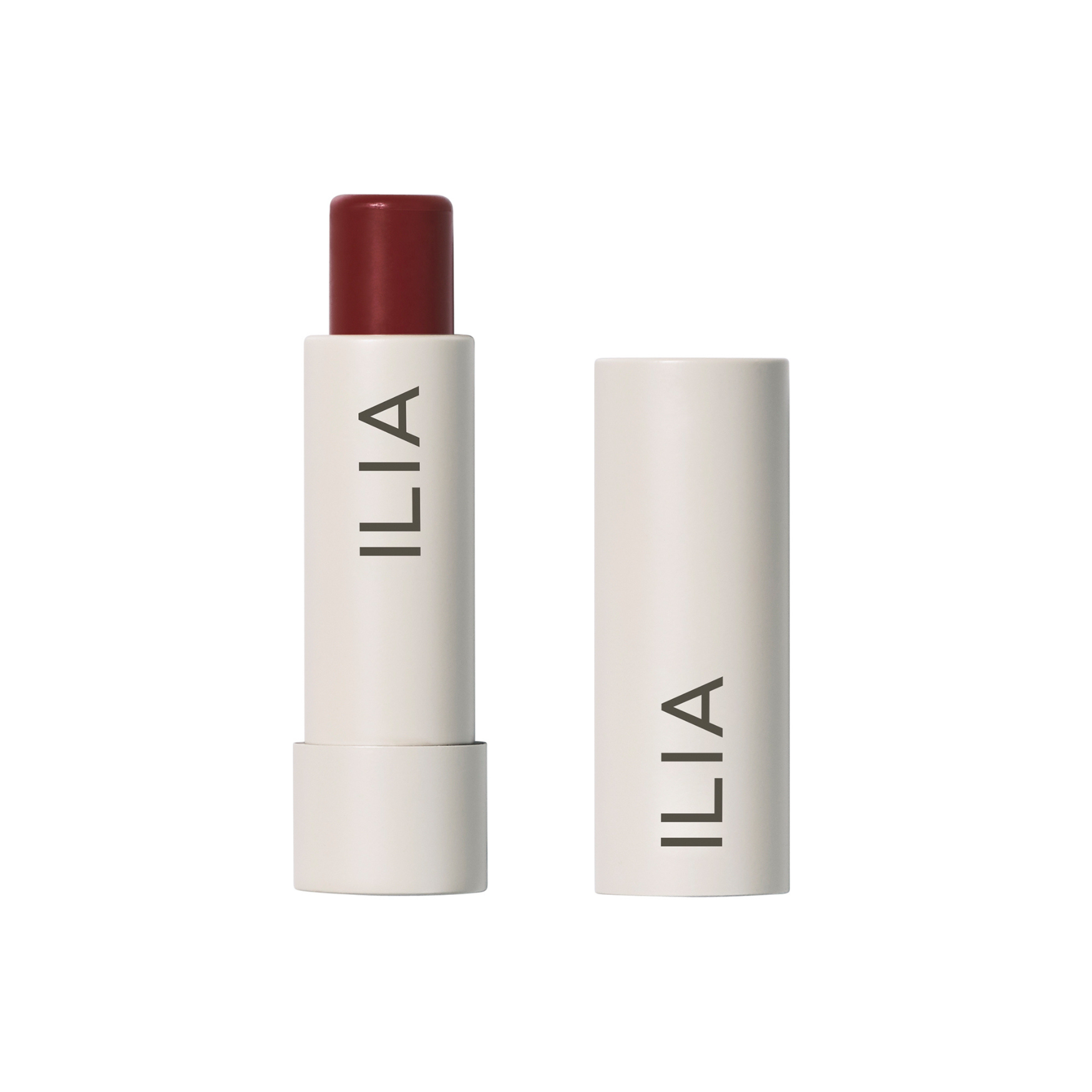 ILIA Balmy Tint Hydrating Lip Balm in weißer Tube mit rotem Lippenstift auf weißem Hintergrund, Lippenpflege
