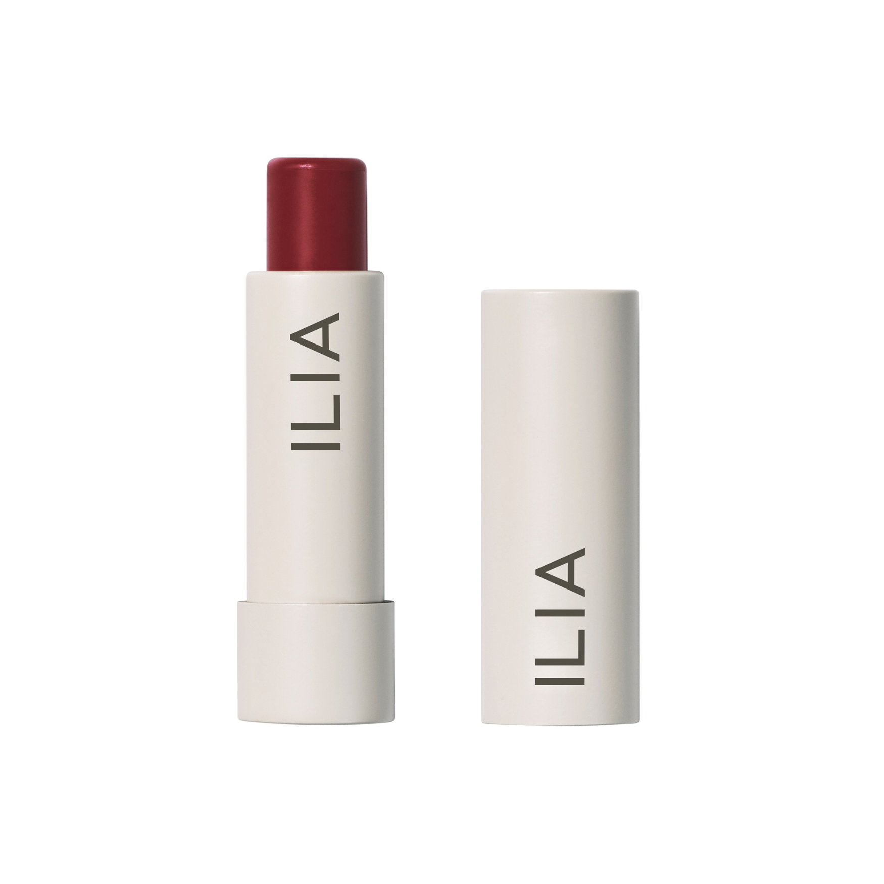ILIA Balmy Tint Hydrating Lip Balm in weißer Tube mit rotem Lippenstift auf weißem Hintergrund, Lippenpflege