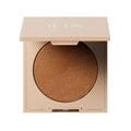 ILIA Daylite Highlighting Powder Showdown in a beige compact case on a white background, highlighter