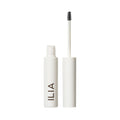 ILIA In Frame Brow Gel white tube with spoolie brush on white background, brow care