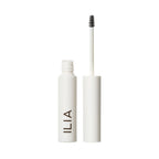 ILIA In Frame Brow Gel white tube with spoolie brush on white background, brow care