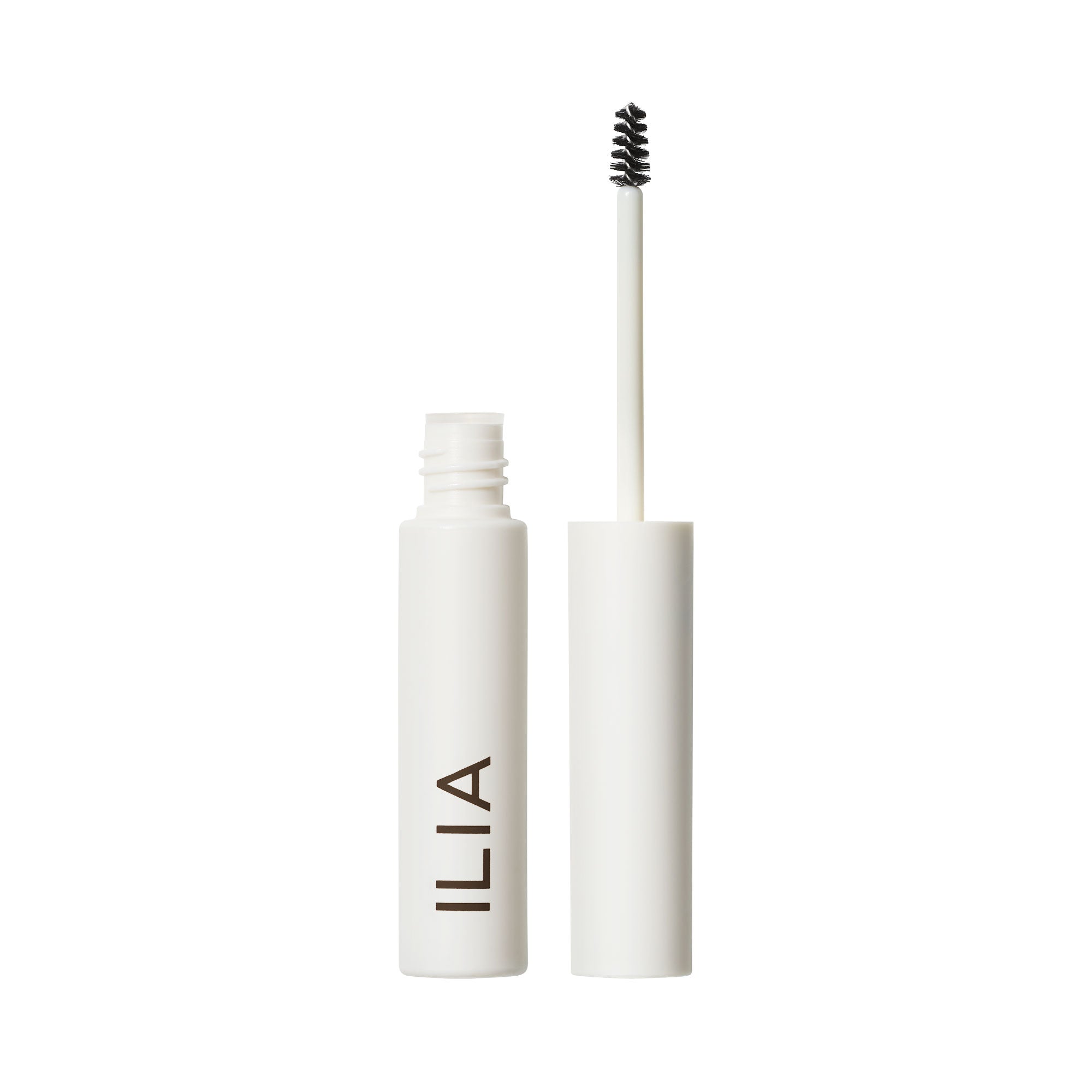 ILIA In Frame Brow Gel white tube with spoolie brush on white background, brow care