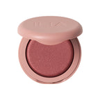 ILIA Soft Focus Blurring Blush in a pink compact jar on a white background, makeup