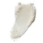 Texture of Johanniskrautbad, bath salt on white background, body care
