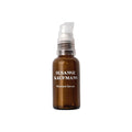 Susanne Kaufmann Nutrient Serum in a glass bottle with a white pump dispenser for skin care.