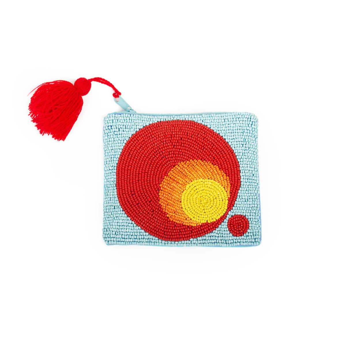 Clutch Pequeño Degradado, a small light blue beaded clutch featuring a red and yellow circular design and a red tassel.