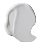 White texture of the Pflegende Reinigungsmilch on white background, skin care