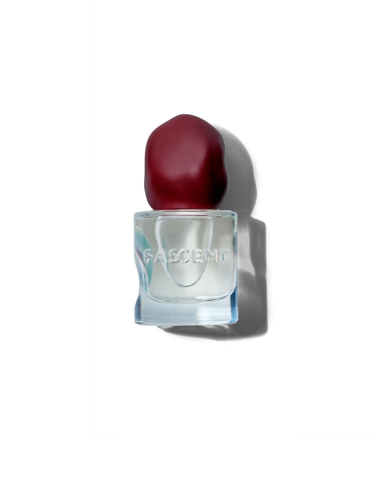 FASCENT Red Flag Eau de Parfum in a glass bottle with a dark red closure.