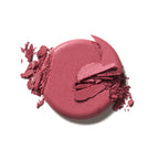 Soft Focus Blurring Blush in a round berry-colored jar on a white background, makeup
