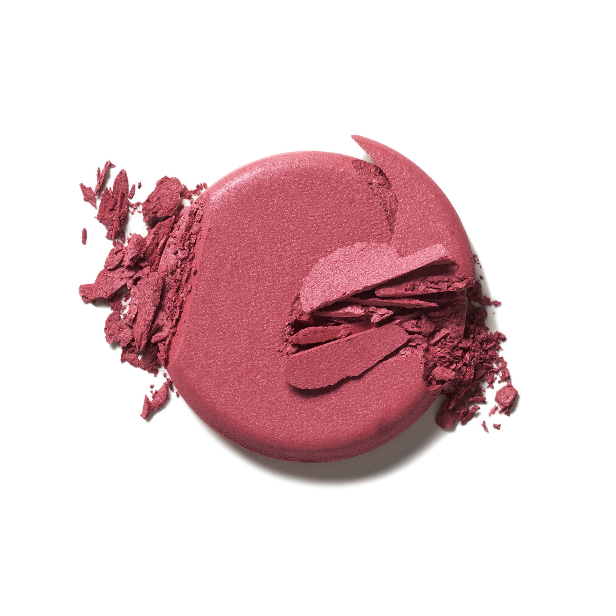 Soft Focus Blurring Blush in a round berry-colored jar on a white background, makeup