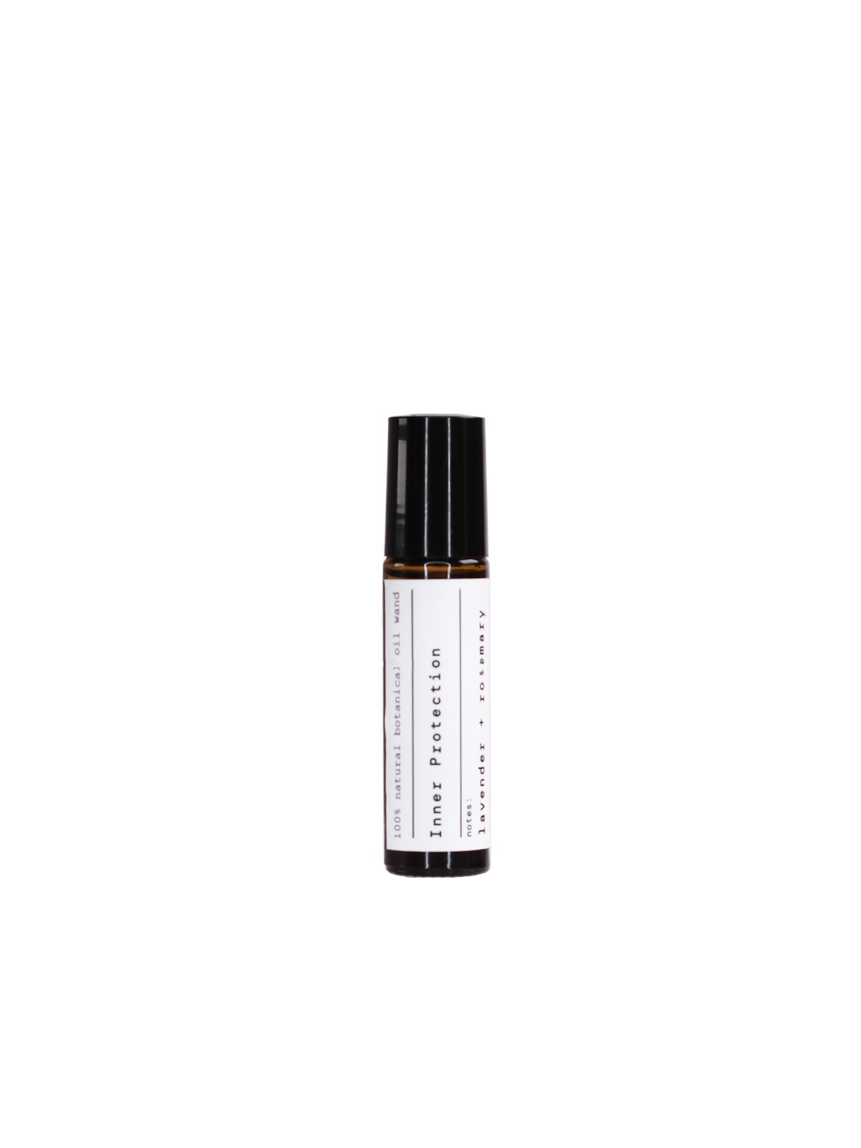 Inner Protection Aroma Roll-on in a dark glass bottle with black cap on black background, aromatherapy