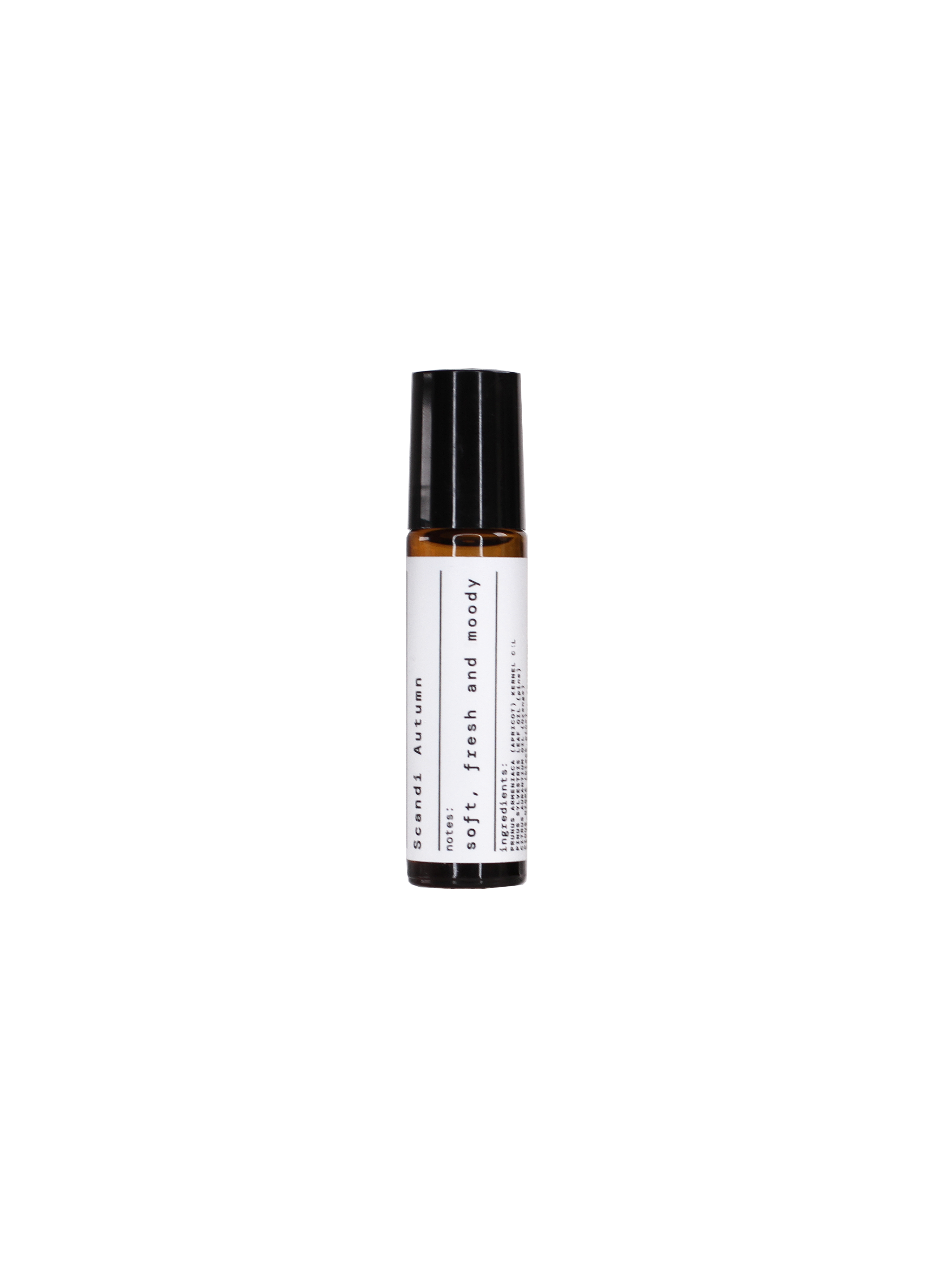 Scandi Autumn Aroma Roll-On in einer braunen Glasflasche mit schwarzem Verschluss vor schwarzem Hintergrund, Aromatherapie