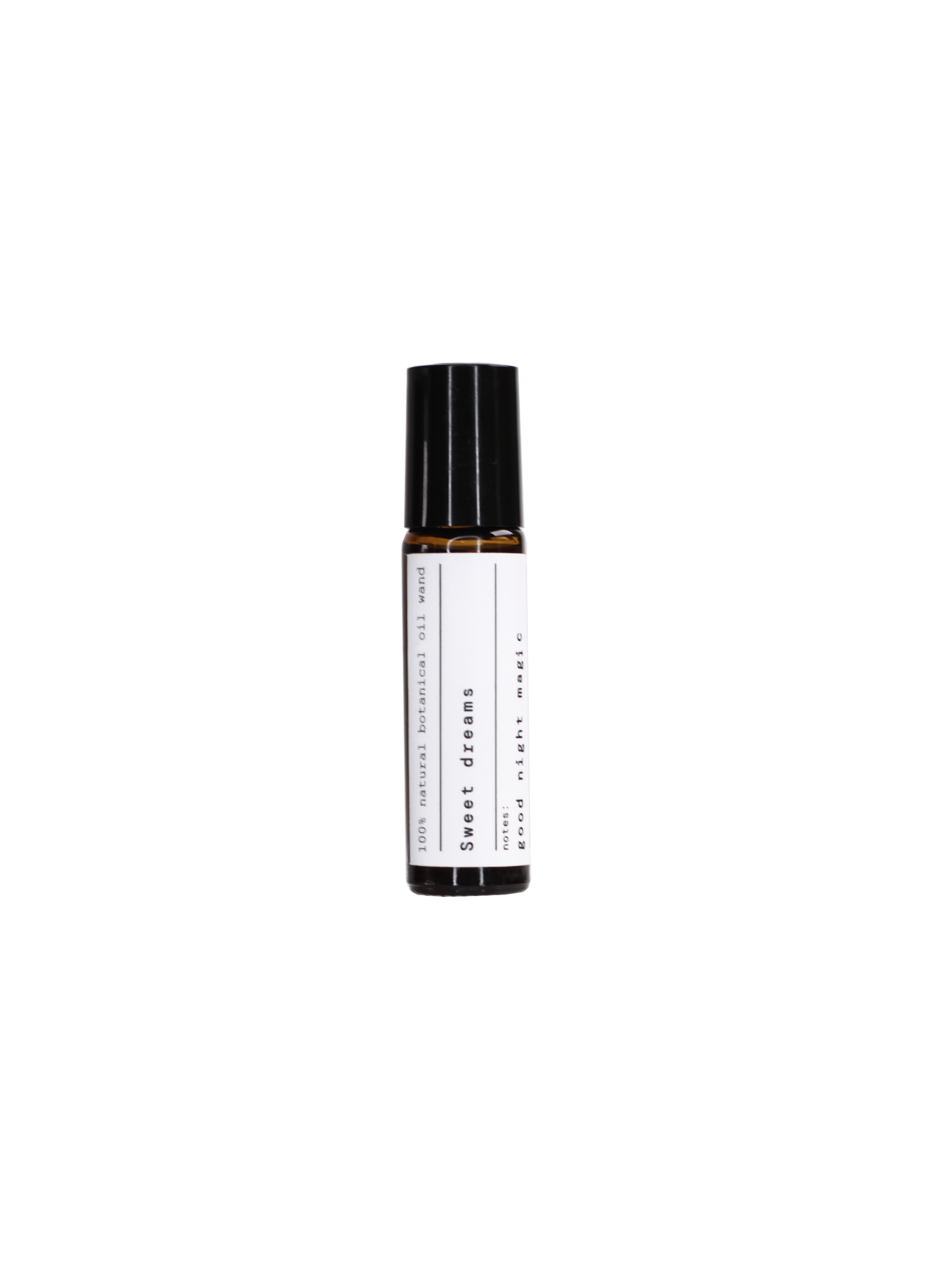 Sweet Dreams Aroma Roll-On in einer braunen Glasflasche mit schwarzem Verschluss vor schwarzem Hintergrund, Aromatherapie.