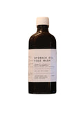 The Witchery Spinach Oil Face Wash in a brown bottle with a white screw cap, skin care.