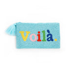 Voilà Clutch, a light blue beaded small bag featuring a colourful "Voilà" lettering and a light blue tassel.