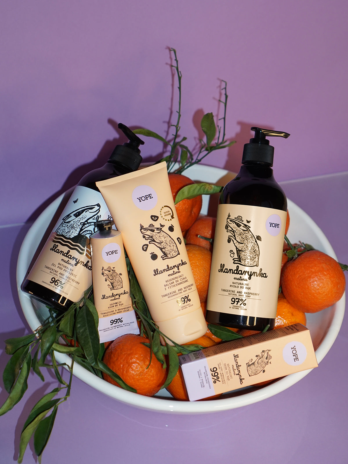 YOPE Regenerating Body Balm in a beige tube against a purple background, skin care.