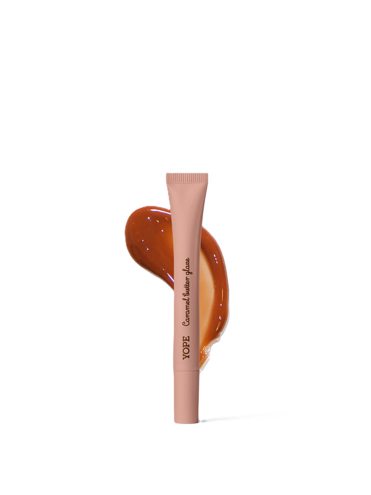YOPE Lana V Caramel Butter Glaze in einer beigefarbenen Tube vor weißem Hintergrund, Lippenpflege.