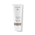 Dr. Hauschka Regeneration Tagescreme – weiße Tube mit braunem Band, weißem Deckel, weißem Hintergrund – Hautpflege