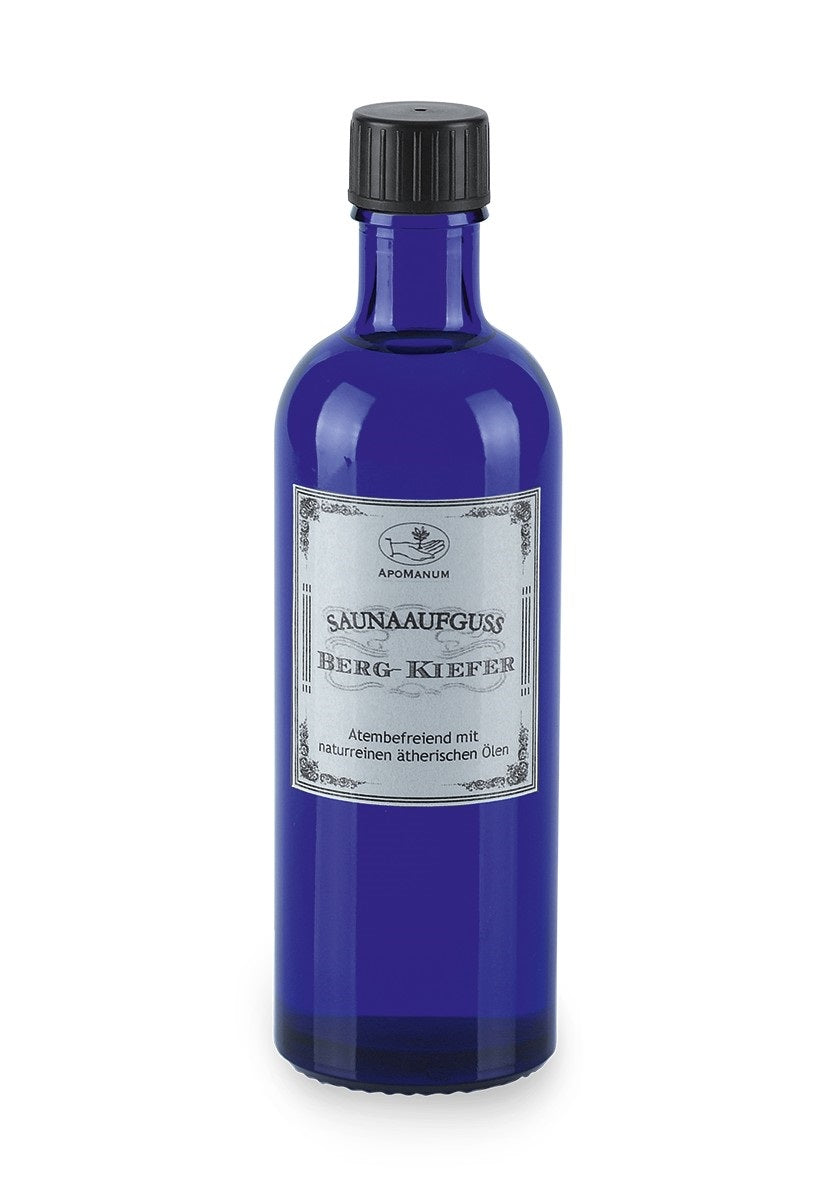 Apomanum Saunaaufguss Berg-Kiefer – blaue Glasflasche mit schwarzem Schraubdeckel, weißem Hintergrund – Saunaaromatherapie