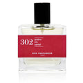 Bon Parfumeur 302: Amber Glasflasche mit schwarzem Verschluss und rotem Etikett auf weißem Grund, Parfum.