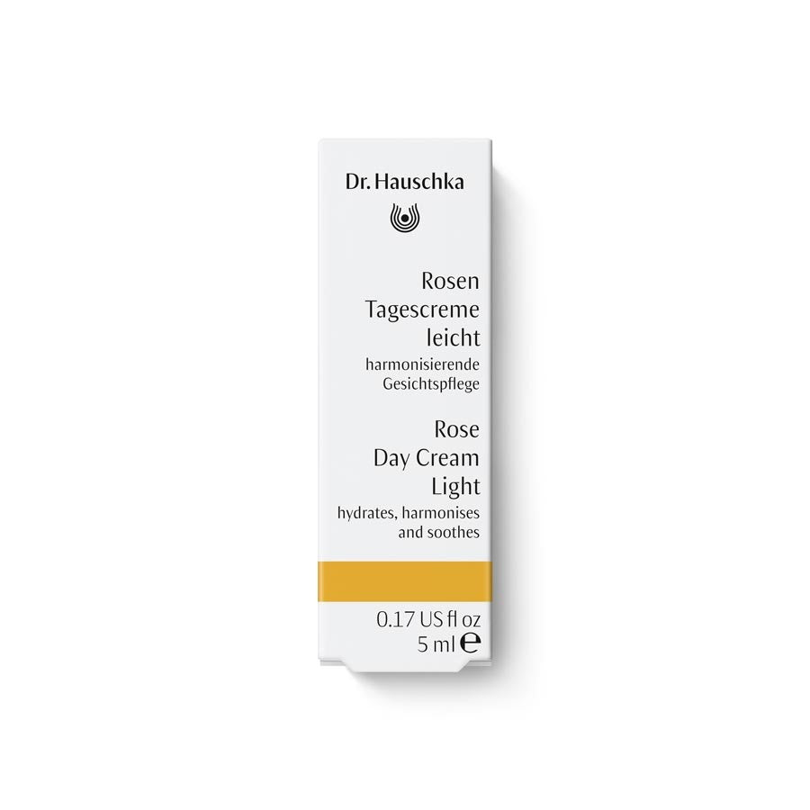 Dr. Hauschka Rosen Tagescreme leicht – weiße Tube 5ml, goldener Streifen, weißer Hintergrund – Gesichtspflege