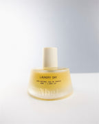 Abel Laundry Day Eau de Parfum – yellow glass bottle 50ml, cream cap, white background – perfume